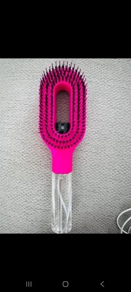 Customer photo review of Scalvée™ Anti-Frizz Hair Brush