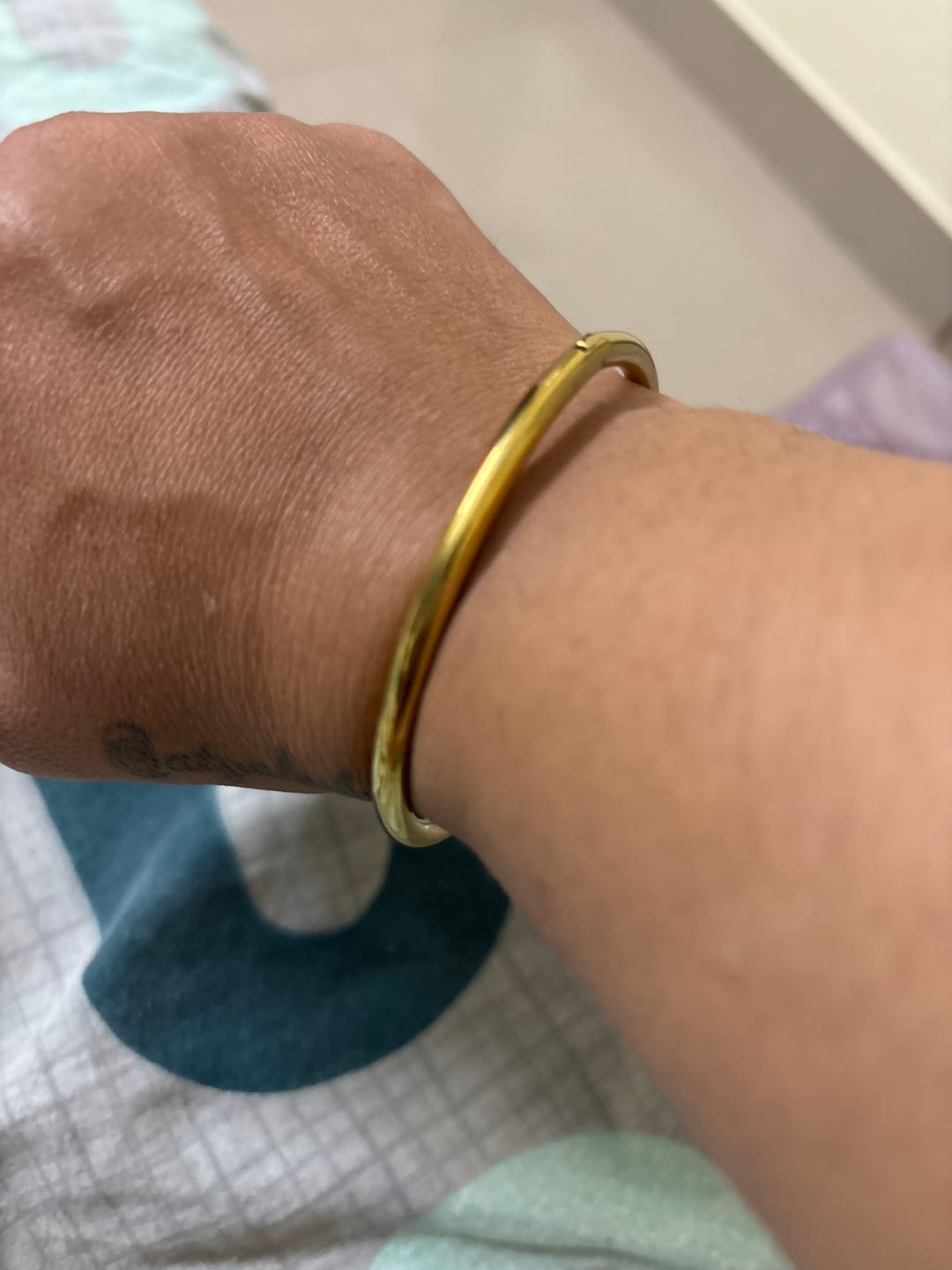 Customer photo review of Classic Gold Bangle Bracelet