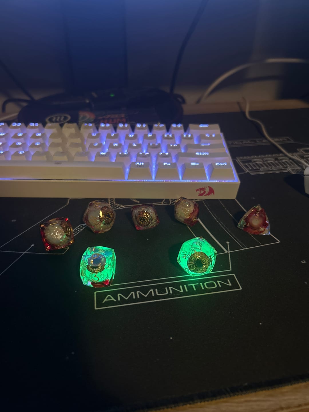 Customer photo review of URWizards D&D Eyes(Glow in the Dark) Liquid Core Dice Set Multi-faceted Style