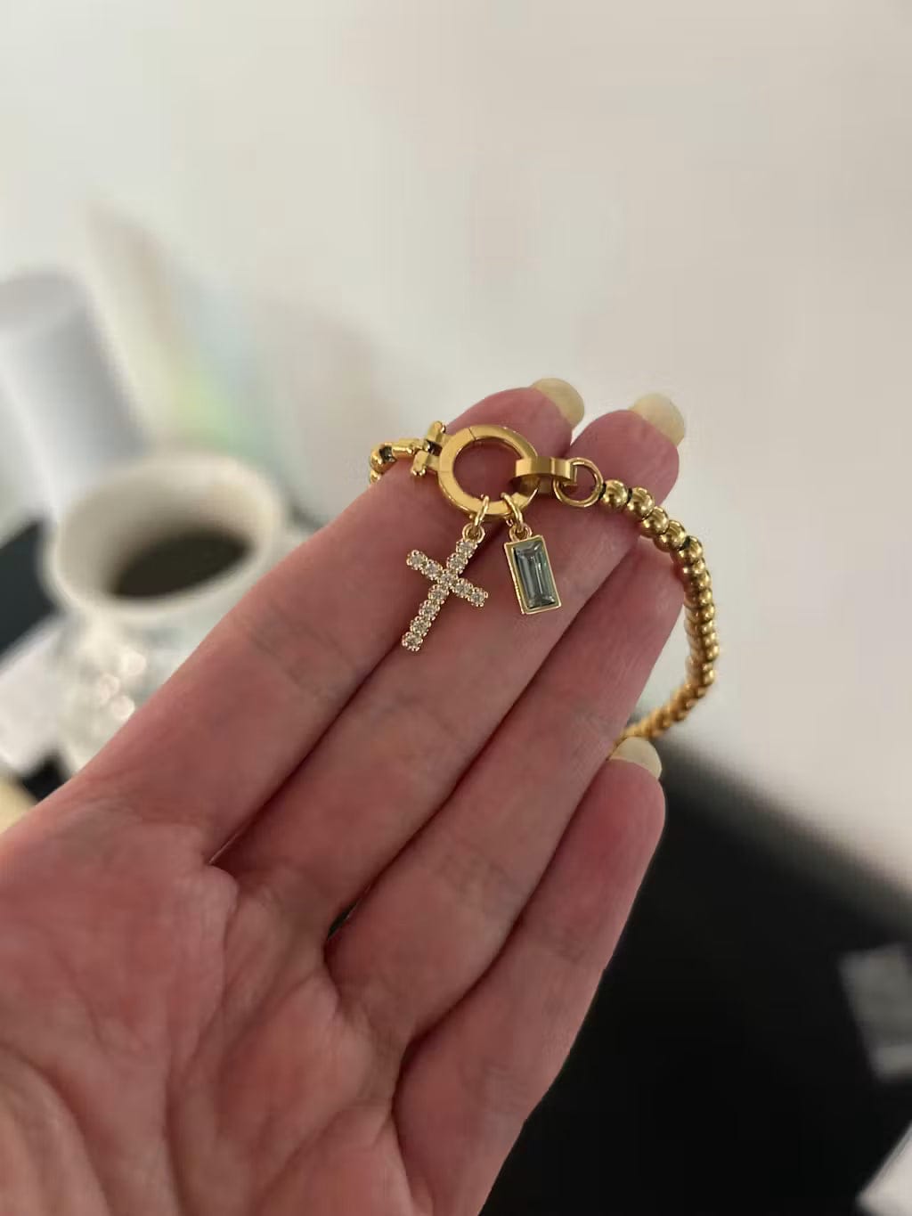 Customer photo review of Birthstone Cross Charm Bracelet
