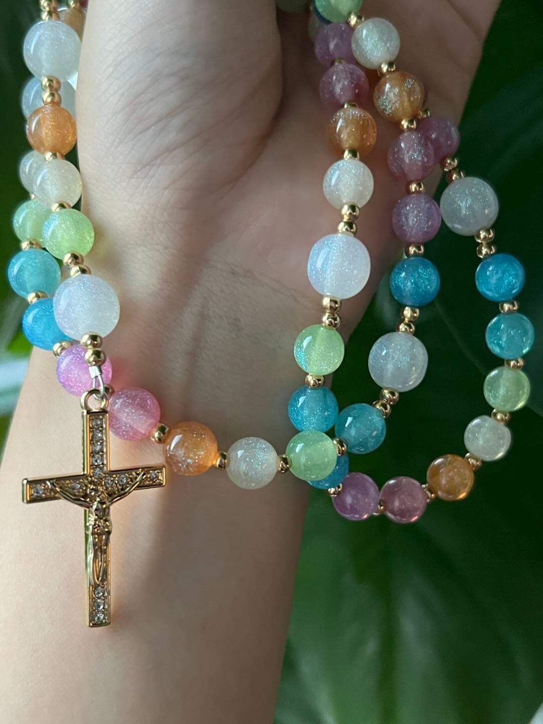 Customer photo review of Solacebeads Rainbow Cat Eye Artistic Rosary With Rhinestone Crucifix: The Timeless Devout Faith