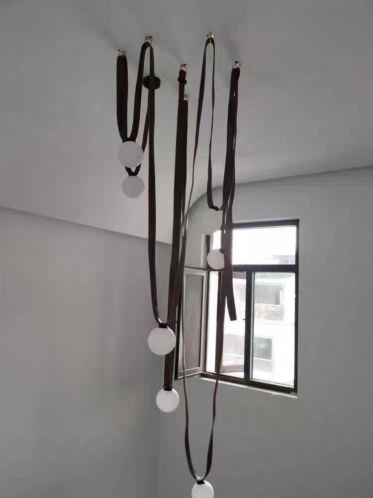 Customer photo review of Multiple Belt Art Pendant Light, Leather or Canvas Glass Globe Chandelier