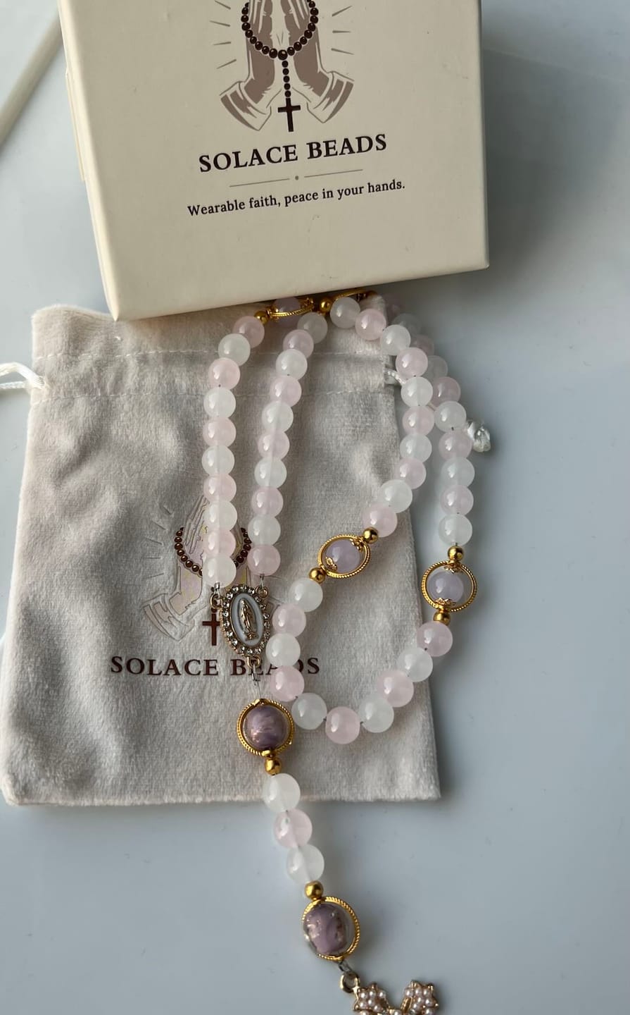Customer photo review of SolaceBeads Artistic Pink & White Beaded Rosary: A Fusion of Colors & Sacred Symbols