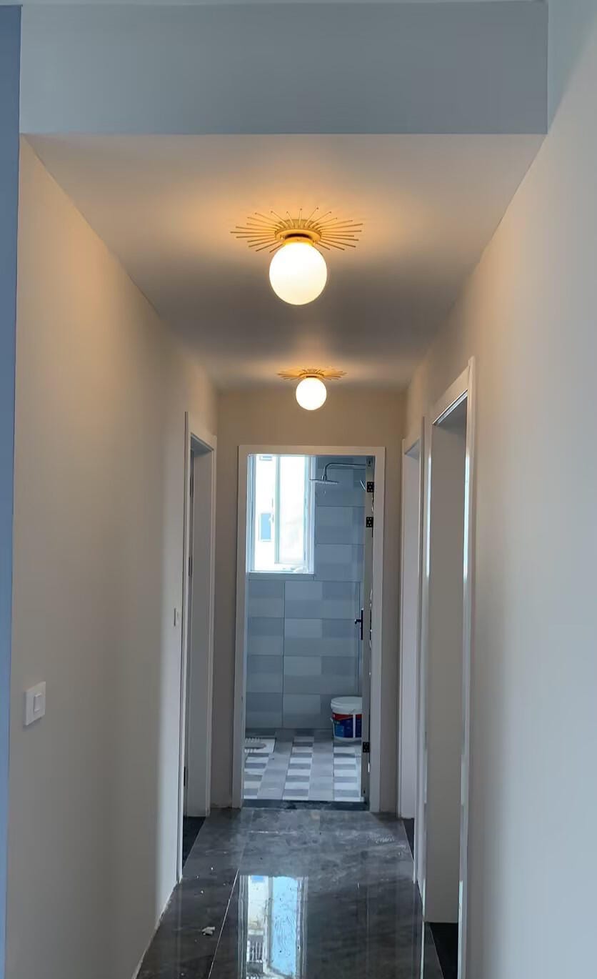 Customer photo review of Brass Ceiling Light, Frosted Glass Globe, Ceiling or Wall Mount