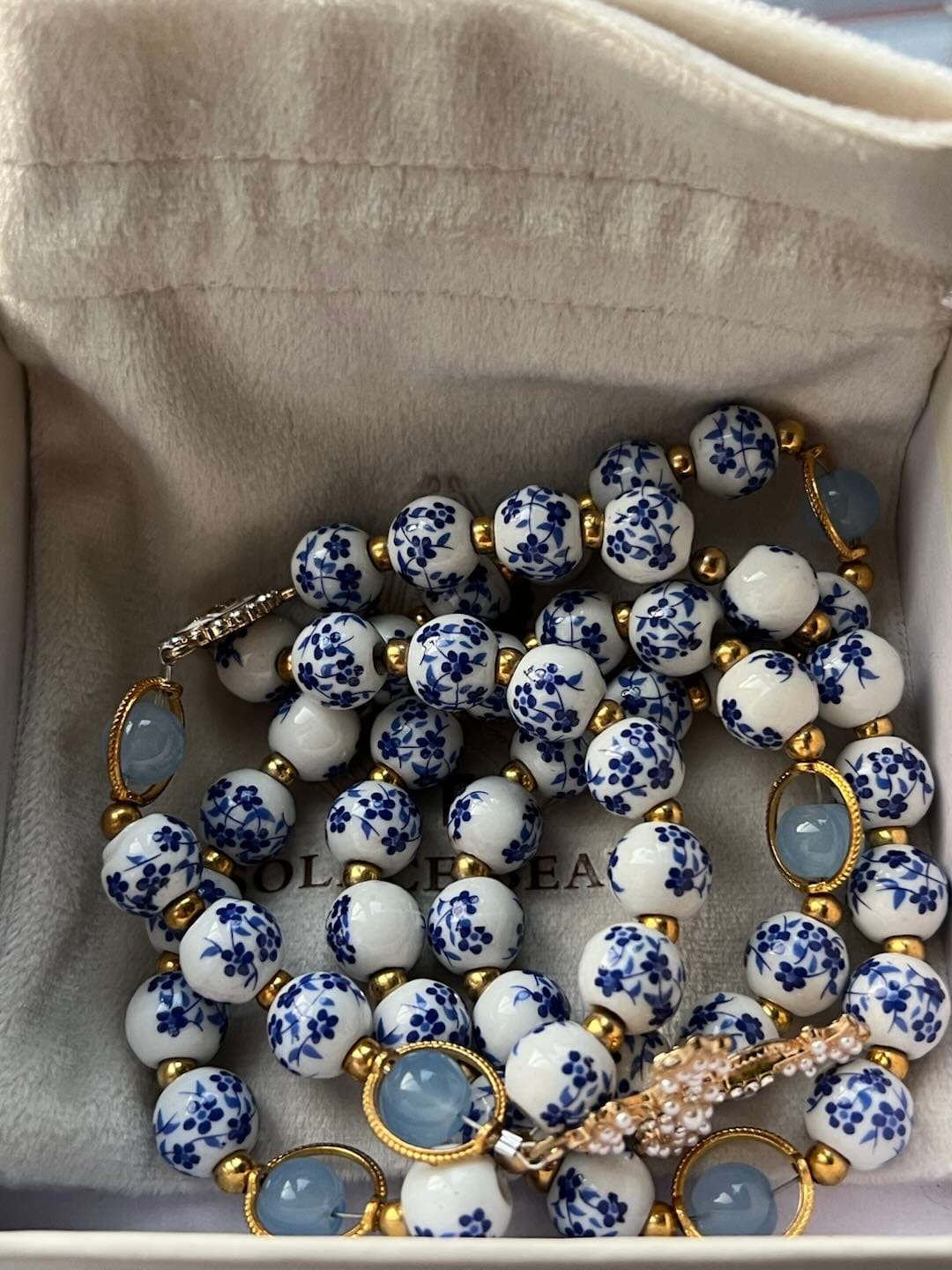 Customer photo review of SolaceBeads Handcrafted Blue Floral Ceramic Rosary: A Tapestry of Grace in life