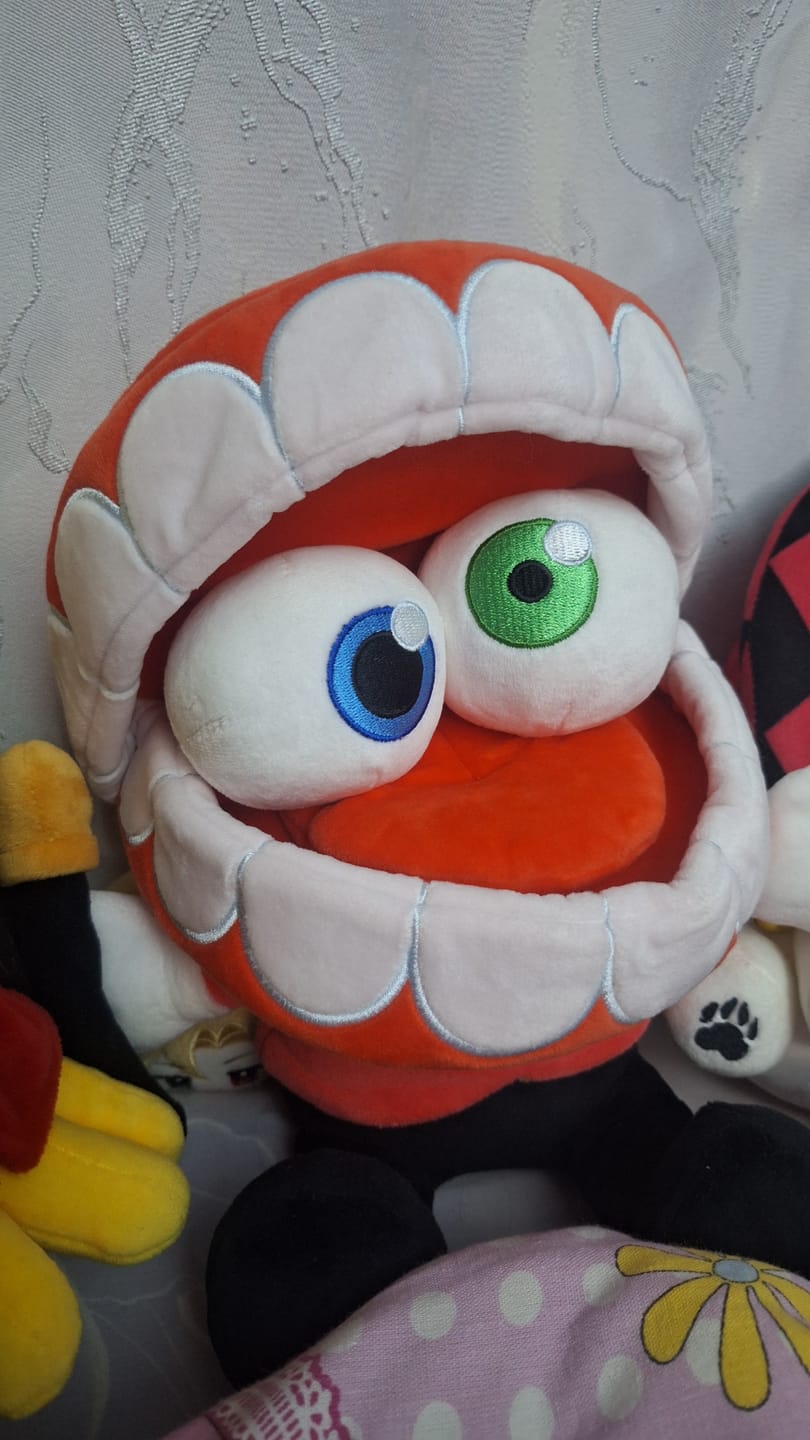 Customer photo review of Caine Plush