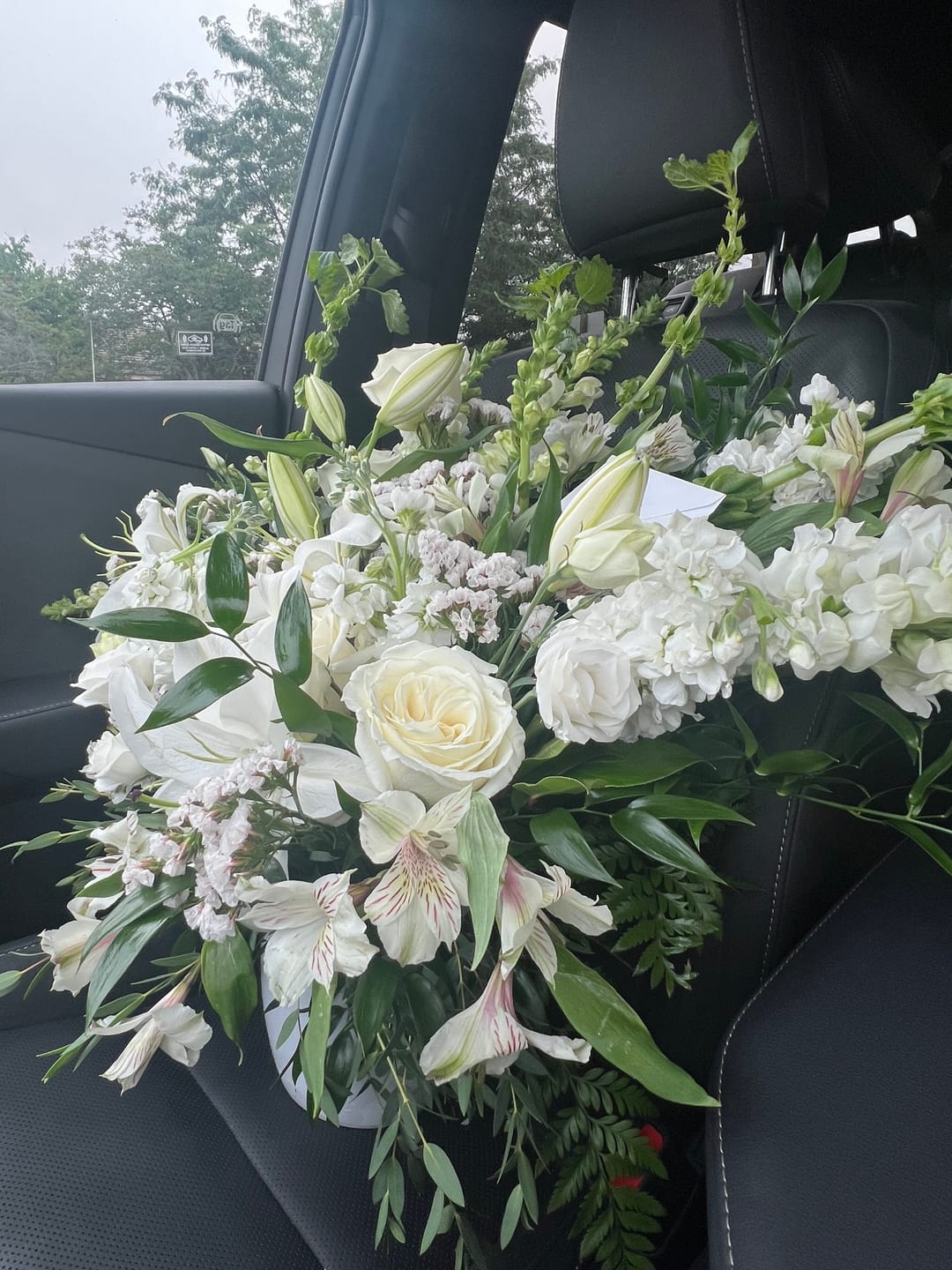 Customer photo review of Large White Sympathy Arrangement