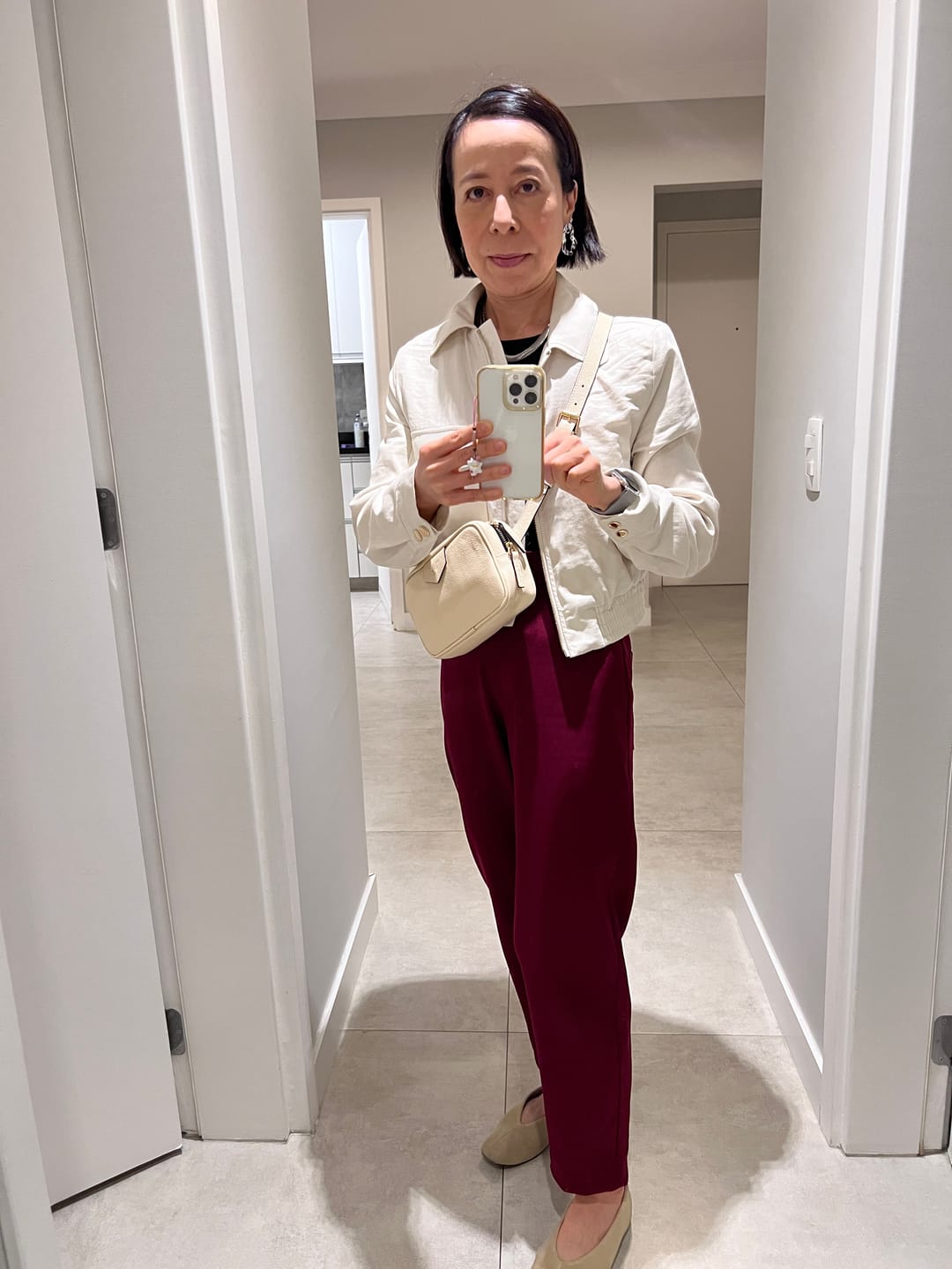 Customer photo review of Pochete Cla Couro Adô Cor Creme Brulee