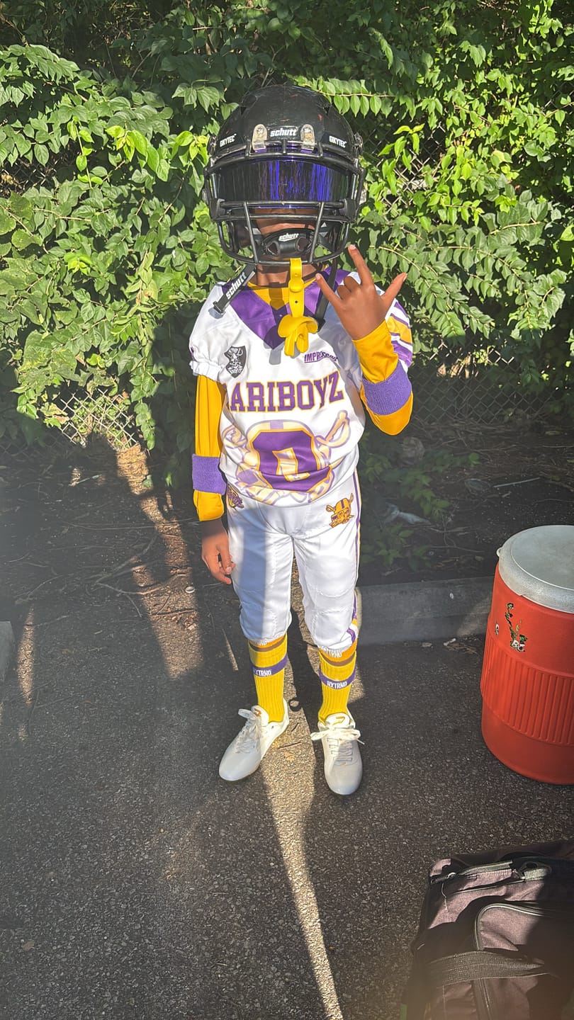 Customer photo review of Phenom Elite Quantum Carbon Football Cleats – Gold Rush (White & Gold)