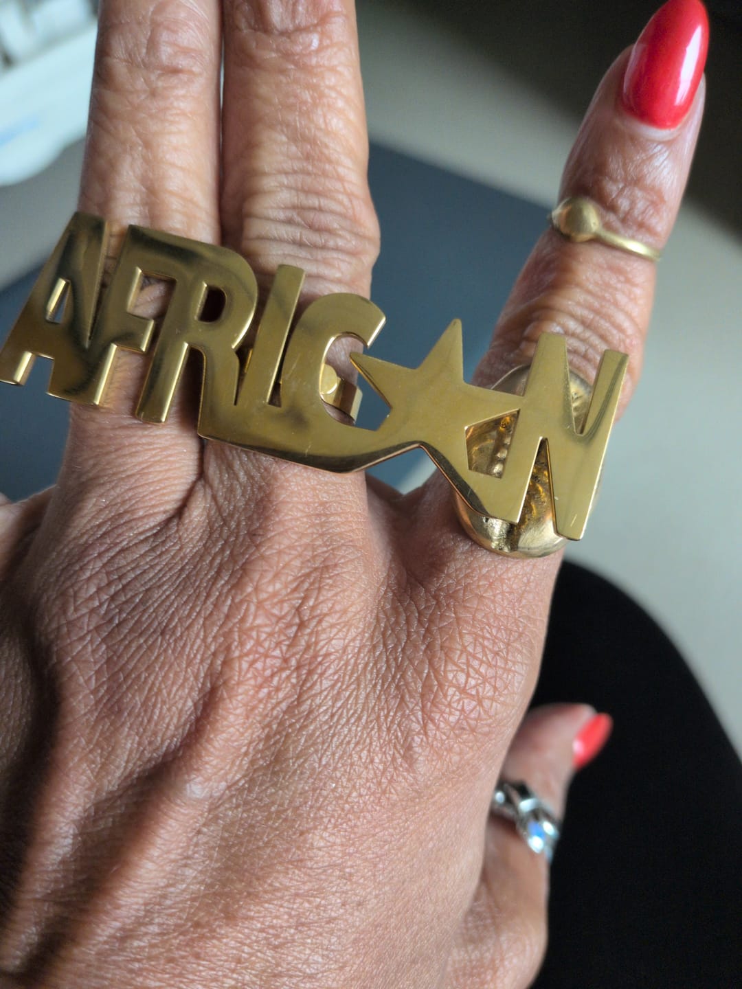 Customer photo review of I am African Gold Star Ring - Unisex