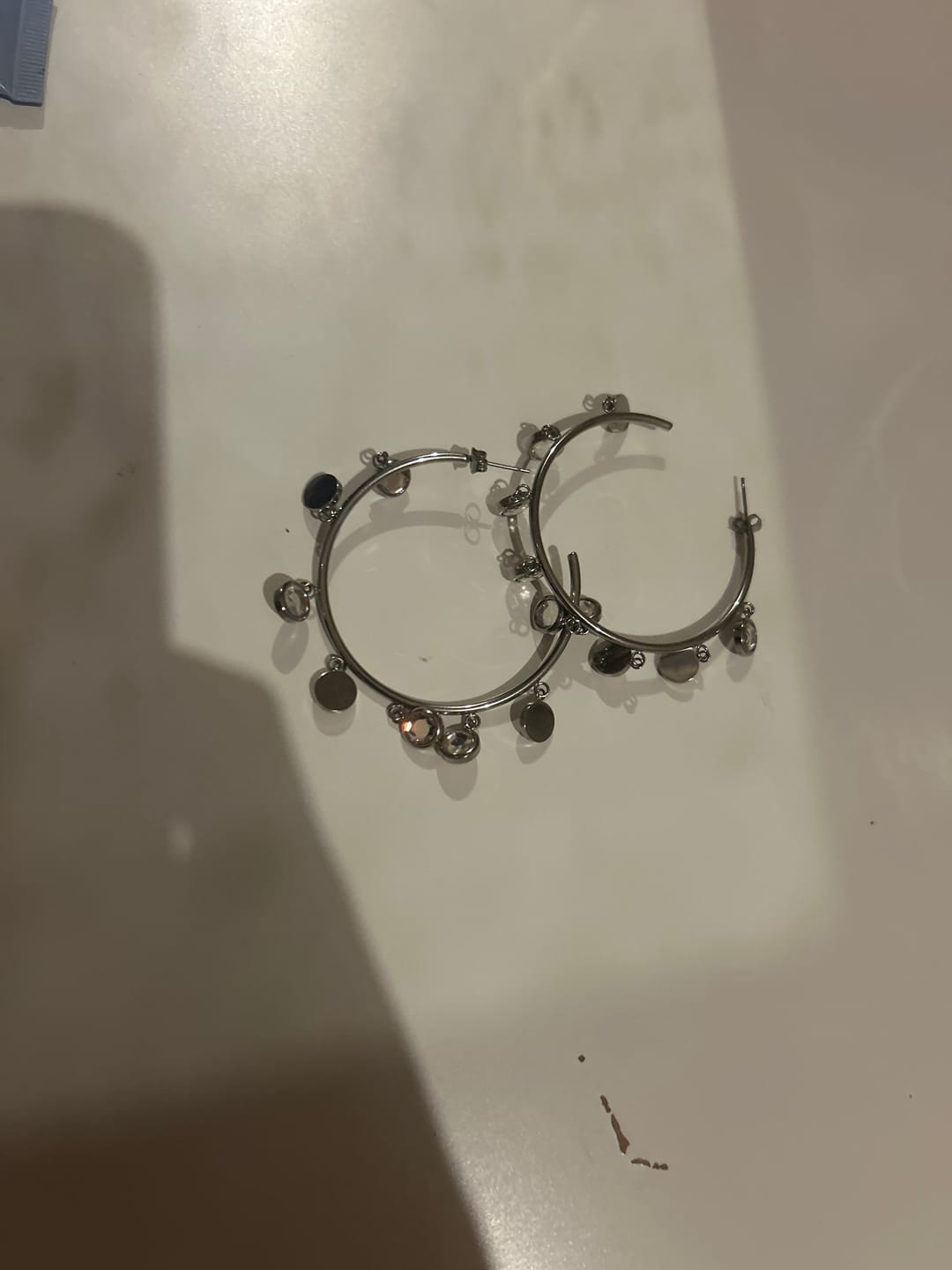 Customer photo review of Faiza Silver Crystal Droplet Statement Hoops