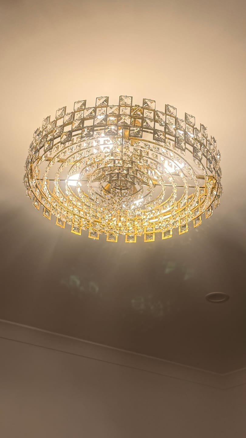 Customer photo review of Luxury 8-Light Hollow Design Facets Crystal Round Drum Chandelier