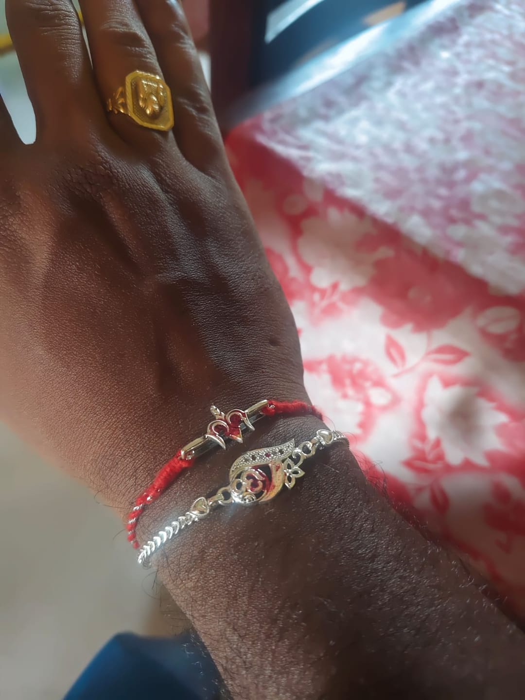 Customer photo review of 925 Silver Trishul Watch Charm Rakhi S