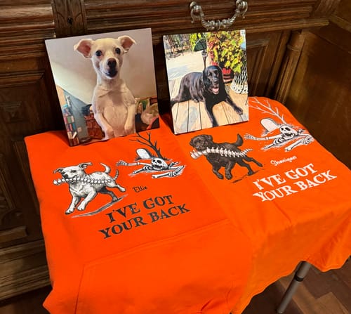 Customer's I've Got Your Back personalized orange shirts, displayed with matching dog photos.