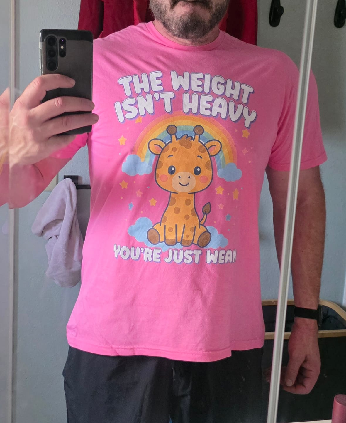 Customer photo review of The Weight Isn't Heavy T-Shirt