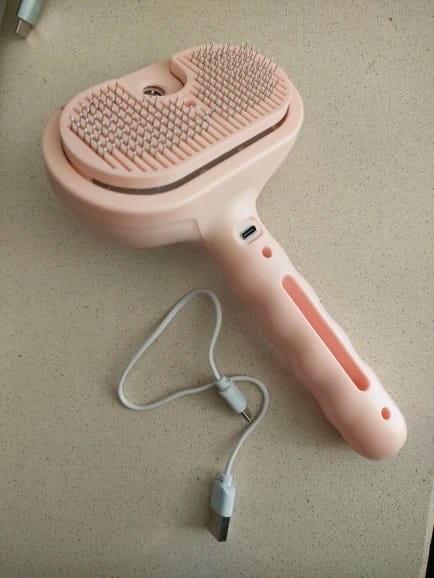 Customer photo review of Premium pet brush with steam function