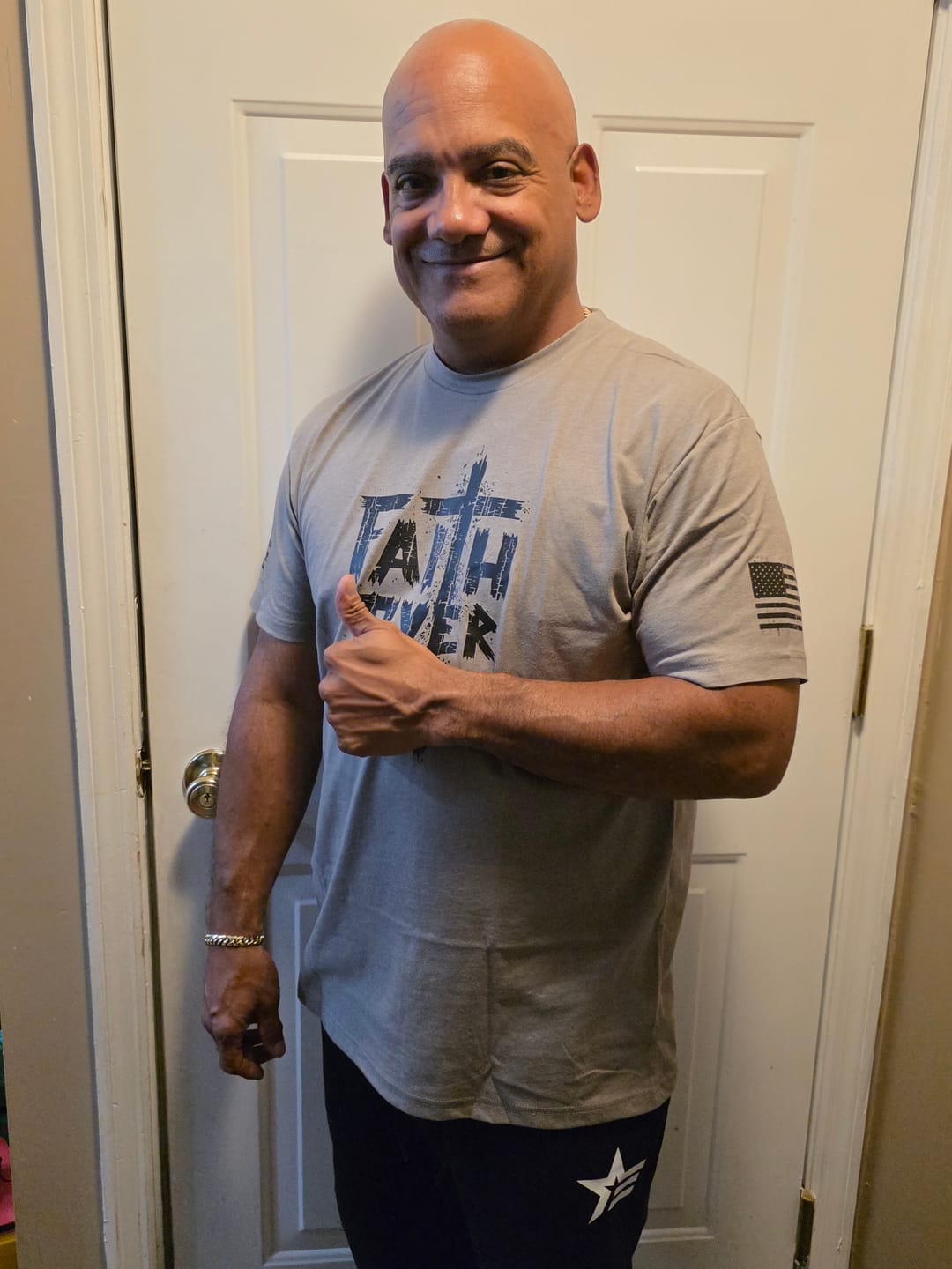 Customer photo review of Faith Over Fear Tee
