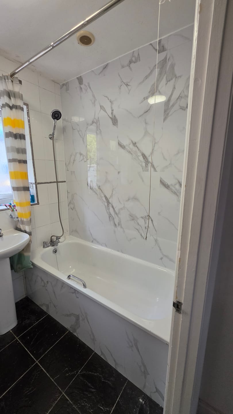Customer photo review of Solid Core White Marble Gloss Shower and Wall Panels 450mm x 900mm - Pack of 4