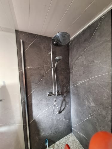 Customer photo review of Panneaux Muraux Marbre SPC Anthracite Mat – Imperméable Salle de Bain