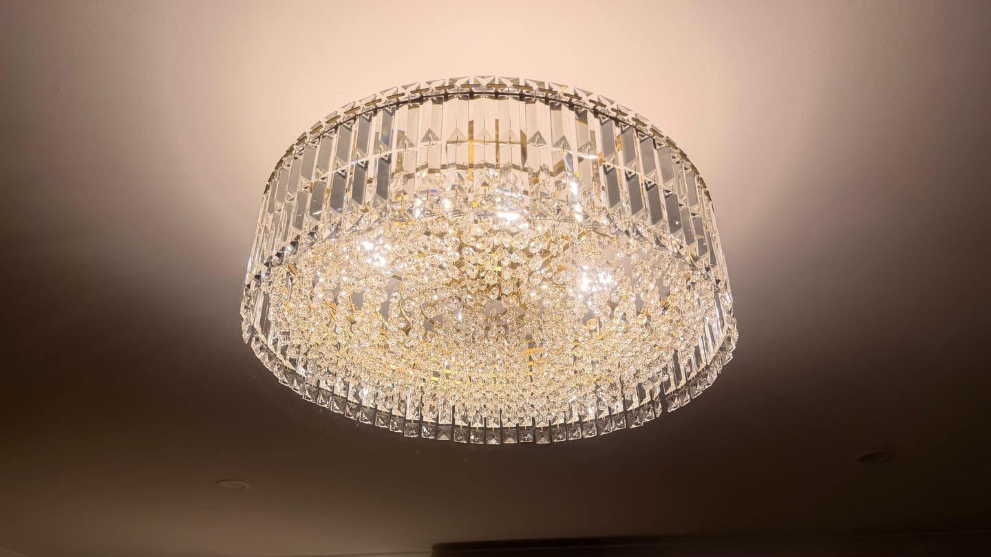 Customer photo review of Luxury 8-Light Crystal Accents Round Drum Chandelier For Dining Room