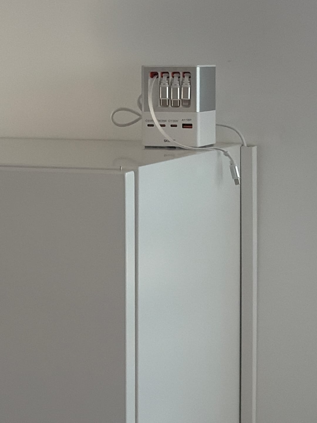 Customer photo review of 6‑in‑1 Charging Station with Retractable USB‑C — Multi‑Device Power Tower