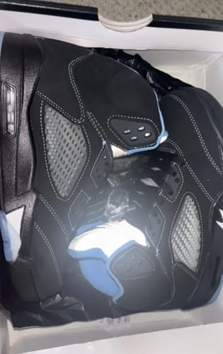 Customer photo review of Jordan 5 black university blue