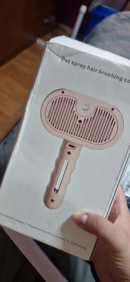 Customer photo review of Premium pet brush with steam function