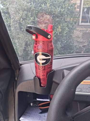 Customer's Georgia Bulldogs Bottle Buddy 24oz in a vehicle cup holder.