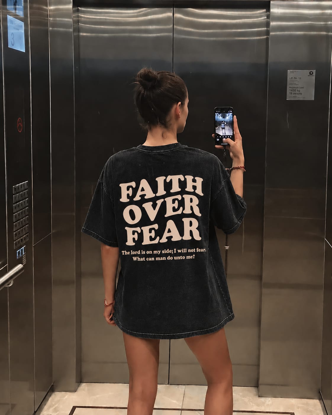 Customer photo review of Faith Over Fear Oversized Christian Graphic Tee