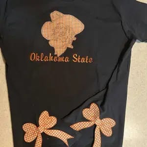 Customer photo review of Custom Tennessee Volunteers Women’s Team Spirit Sweatshirt – Applique Embroidered Side Bow Pullover