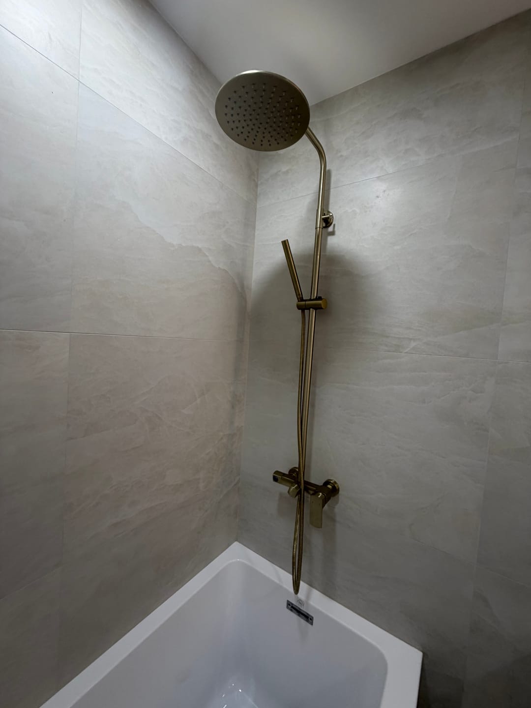 Customer photo review of Exposed Rain Shower Kit with Tub Spout and Slide Bar