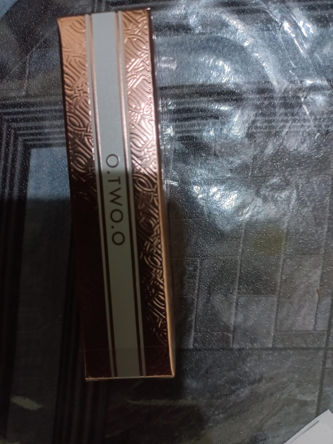 Customer photo review of O.TWO.O HAUTE HYDRATING SATIN LIPSTICK
