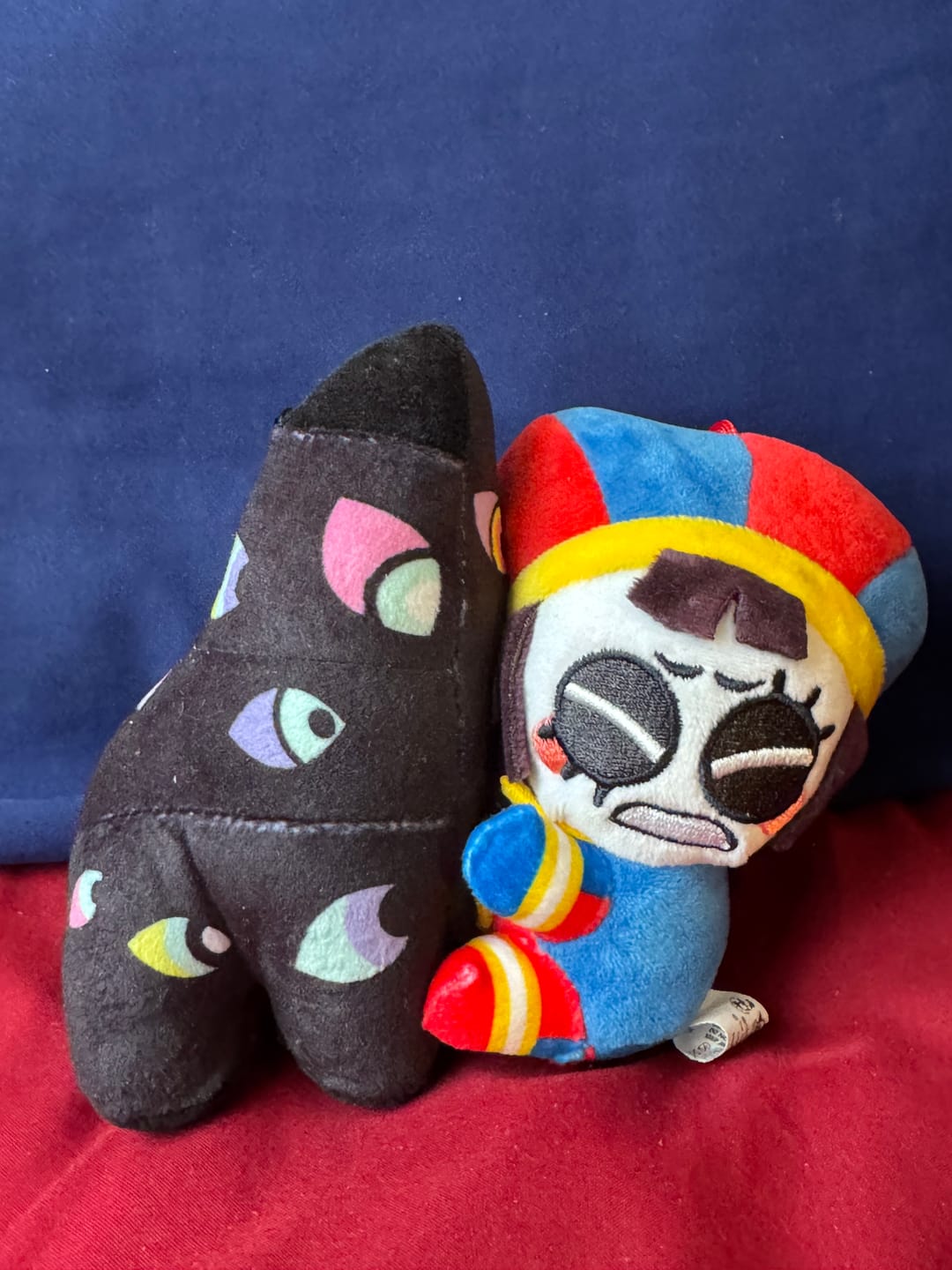 Customer photo review of Pomni & Abstraction Magnetic Plush Keychains