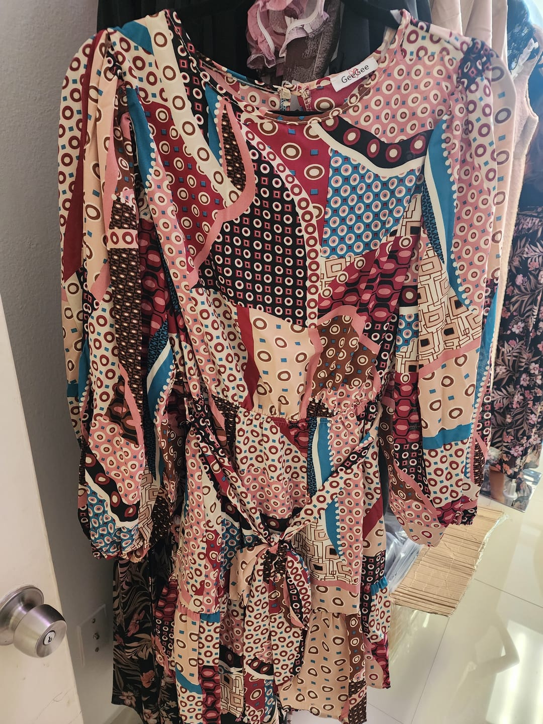 Customer photo review of WOMEN'S LONG SLEEVE ELASTIC WAIST SELF TIE MULTI PRINT MINI DRESS