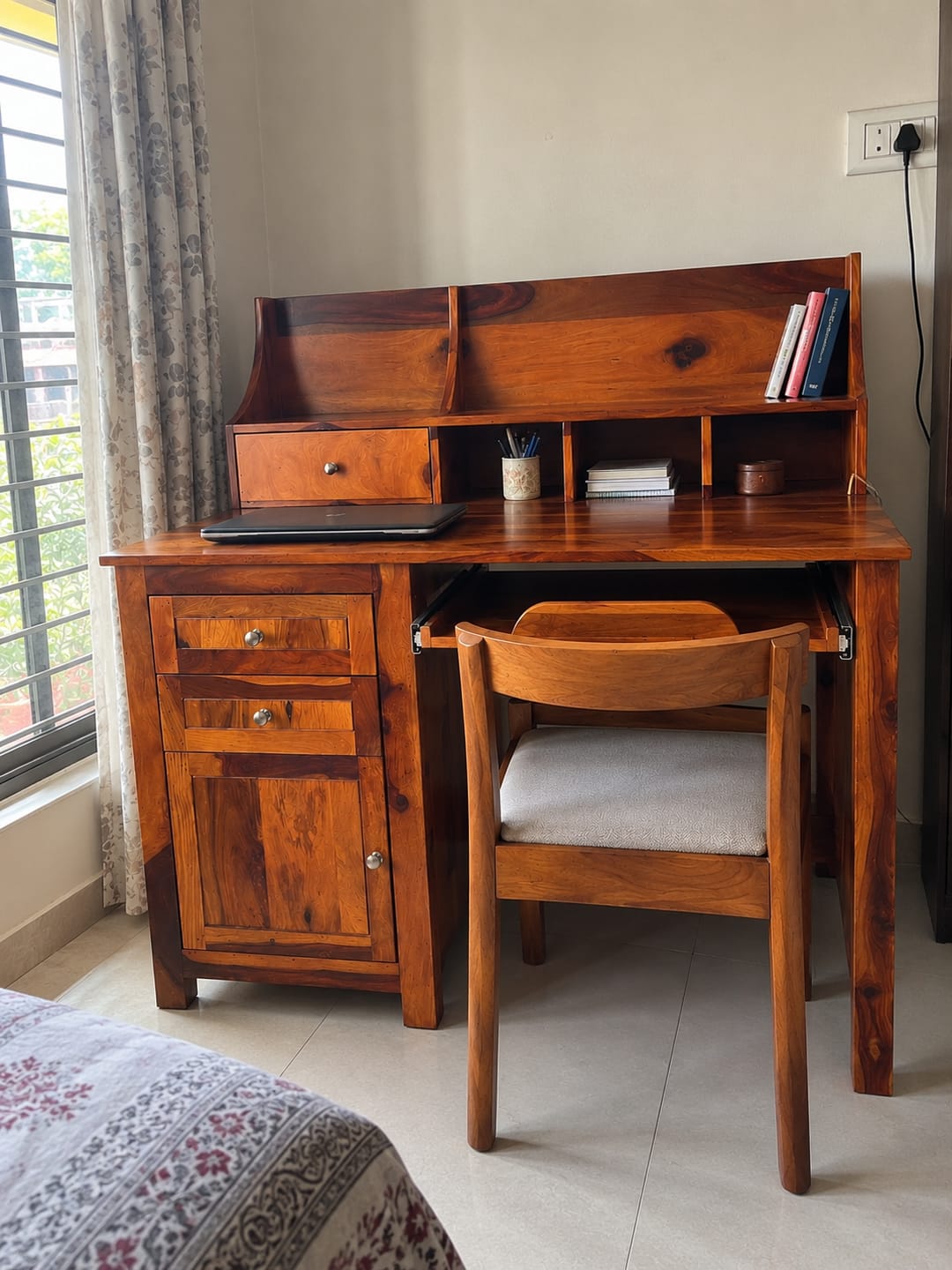 Customer photo review of Alondra sheesham wood study table with storage cabinets and shelve