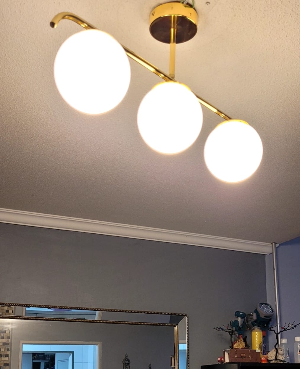 Customer photo review of Lampara Aplique de Techo Nordica Dorada Modelo AURORA
