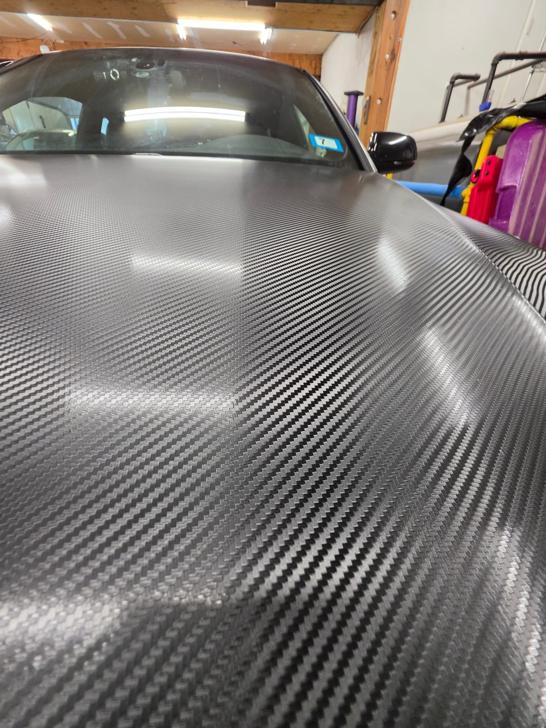 Customer photo review of Satin Classic Black Carbon Fiber Vinyl Wrap
