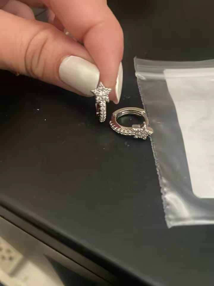 Customer photo review of Dazzling CZ Star Charm Silver-Tone Hoop Earrings