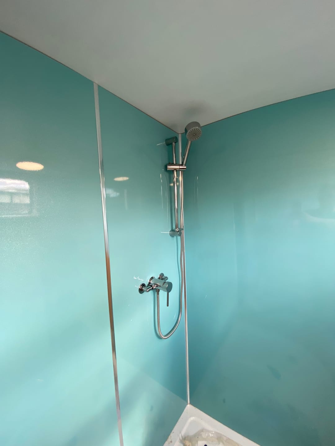 Customer photo review of 10mm Aqua Blue Shimmer Gloss Shower Panel 1M x 2.4M