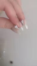 Customer photo review of Dazzling CZ Star Charm Silver-Tone Hoop Earrings