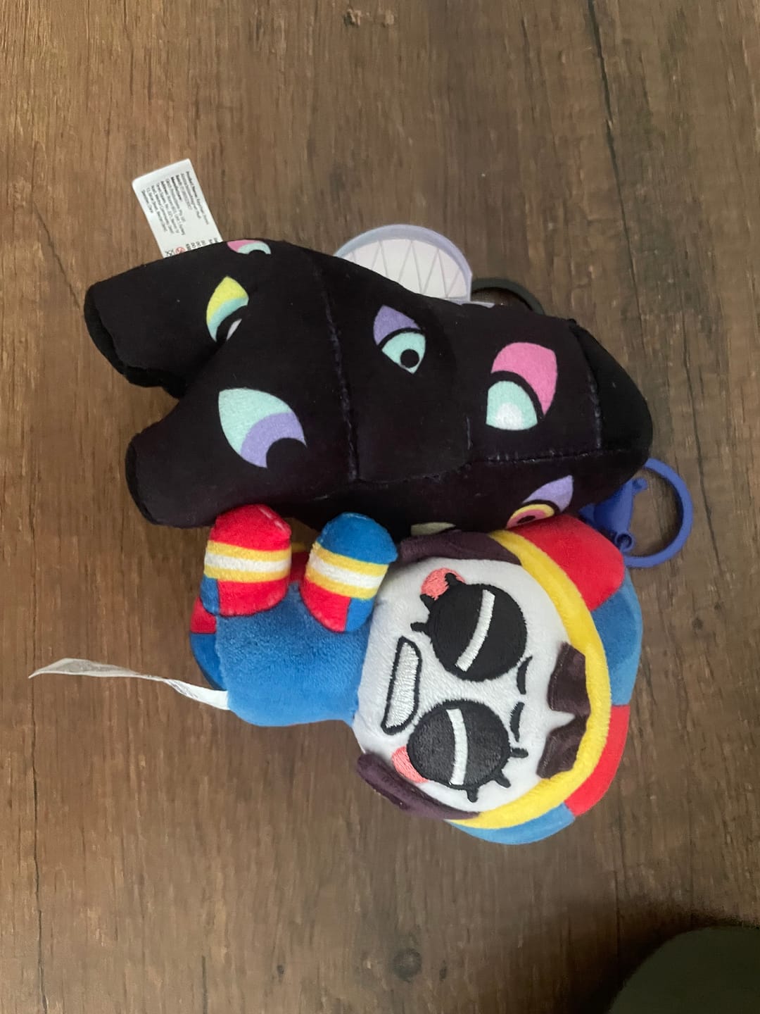 Customer photo review of Pomni & Abstraction Magnetic Plush Keychains