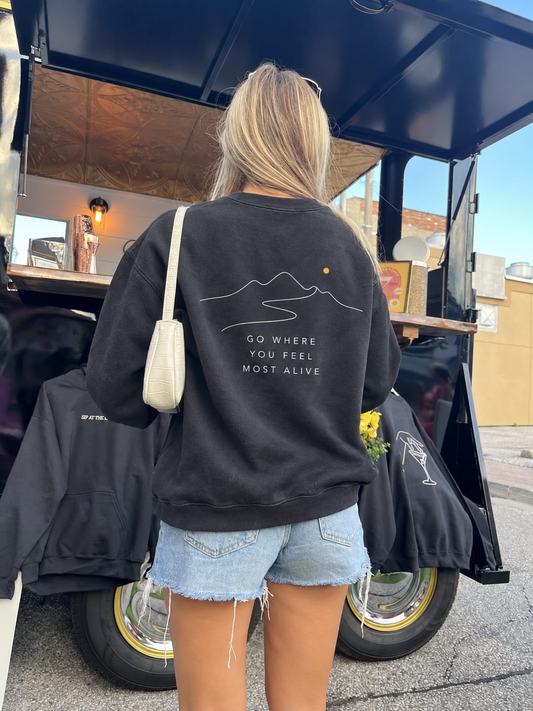 Customer photo review of Go Where You Feel Most Alive Washed Graphic Sweatshirt