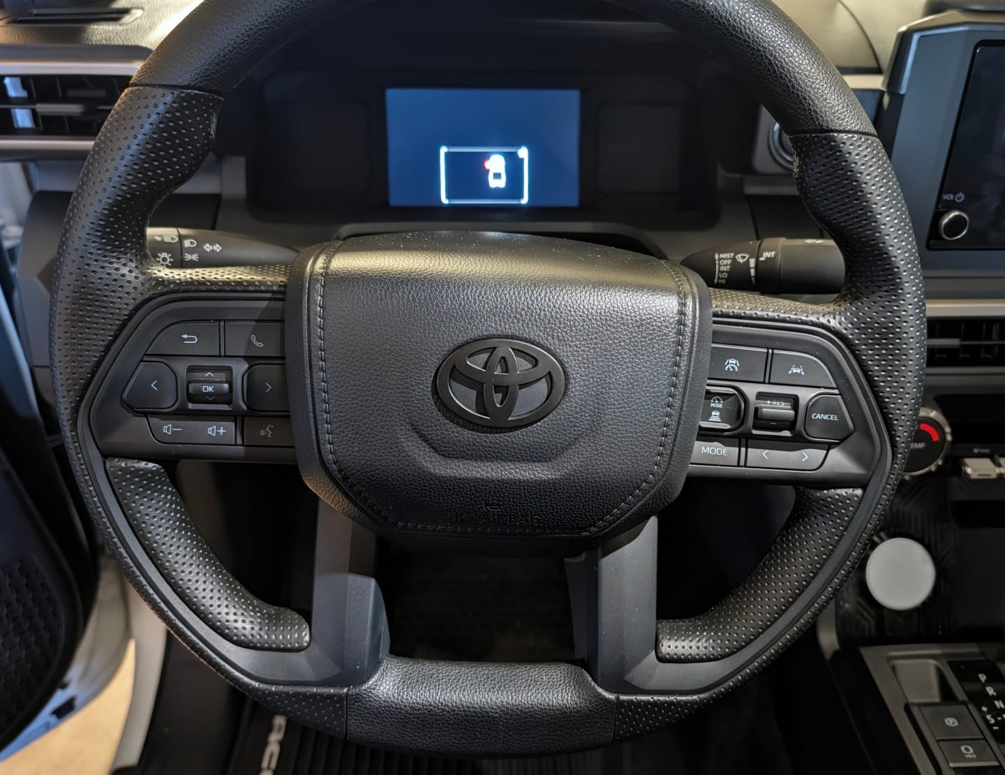 Customer photo review of NEW Black Matte Steering Wheel Emblem Fits NEW Models 2024-2026 Tacoma, 4Runner & Camry