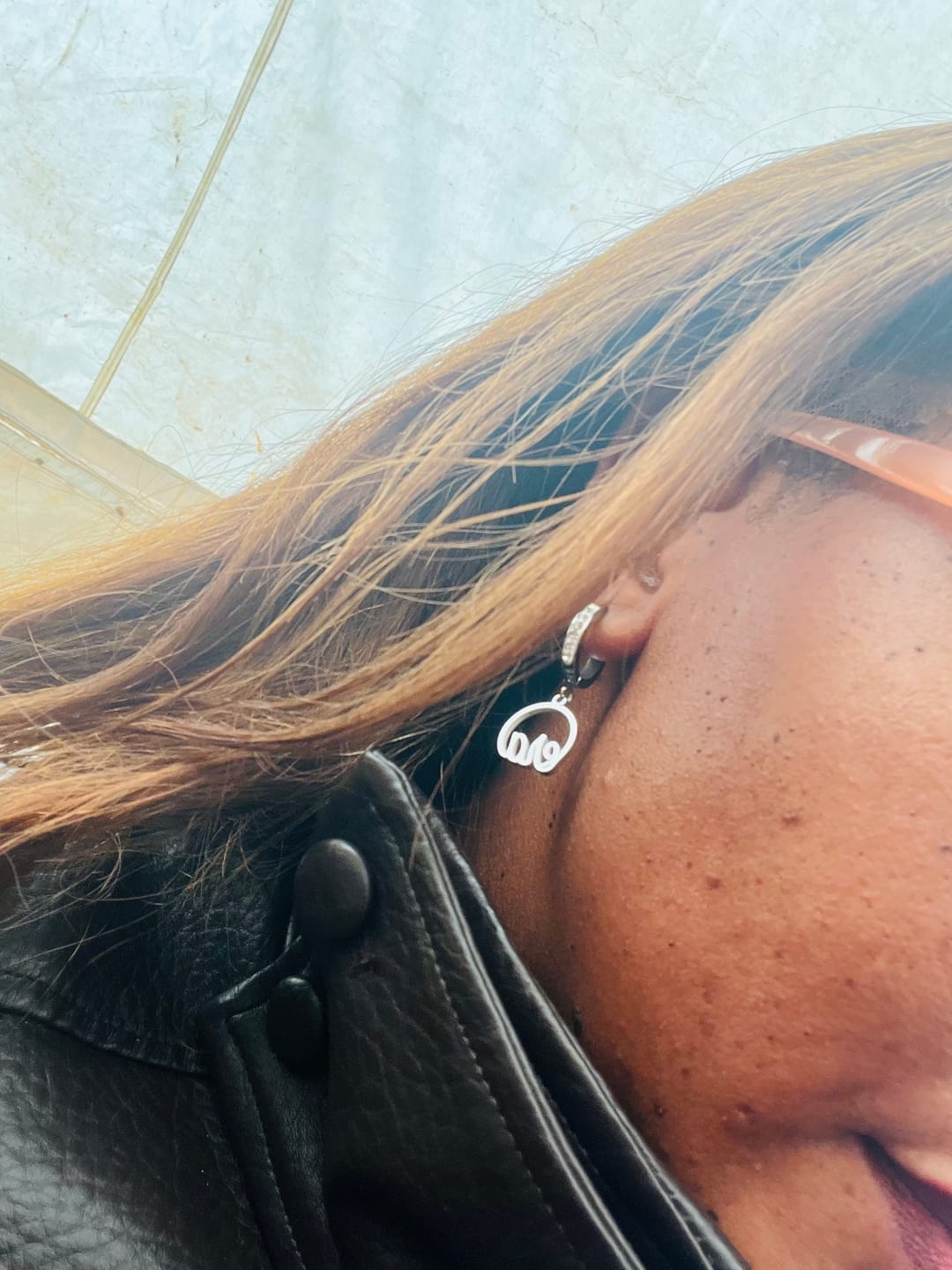 Customer photo review of Silver Precious Logo Earrings