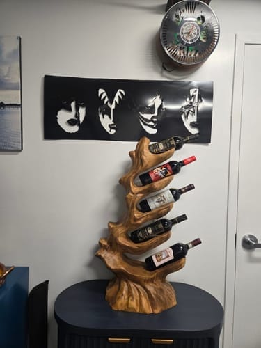 Customer photo review of Solid Wood Sculptural Wine Holder with Vertical Wave Design Bottle Display Stand