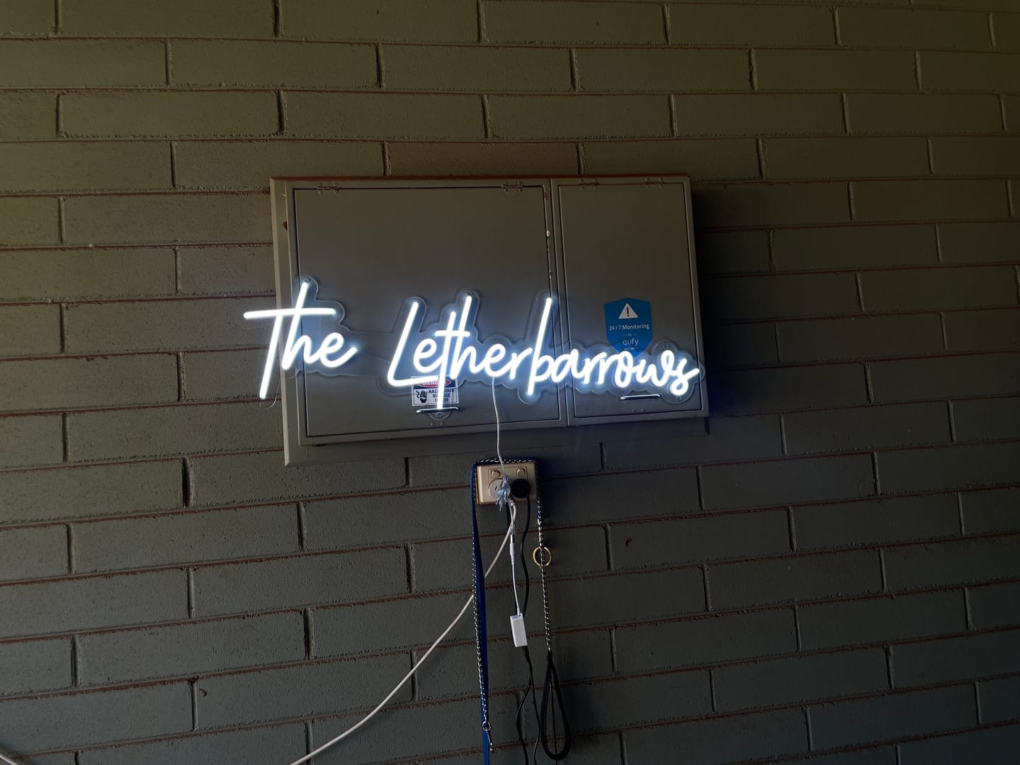Customer photo review of Custom neon sign The Letherbarro...