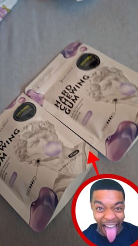 Customer's two JAWLINER Chewing Gum packages with a small, circular portrait of a smiling person below.
