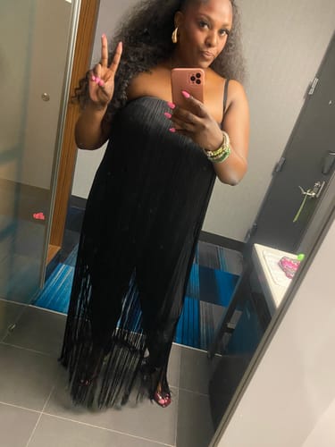 Customer's Butter Fringe Stirrup Jumpsuit in black, shown as a full-length mirror selfie.