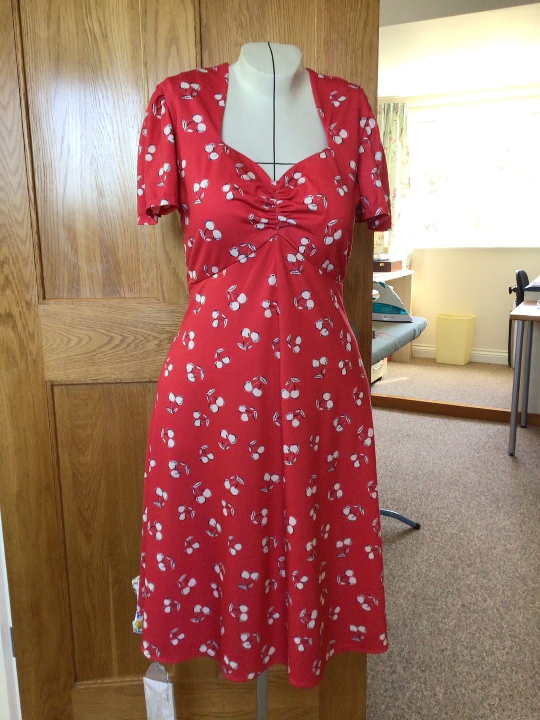 Customer photo review of Red Cherry Print Super Soft Spun Poly Stretch Fabric