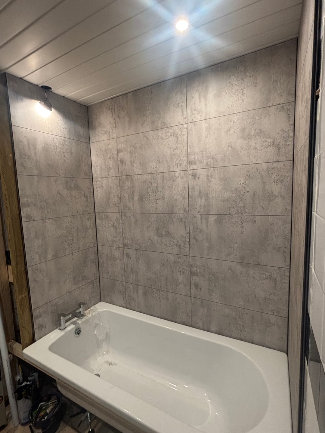 Customer photo review of Premium Grey Concrete Tile Matt Shower Wall Panel – 2.6M x 600MM